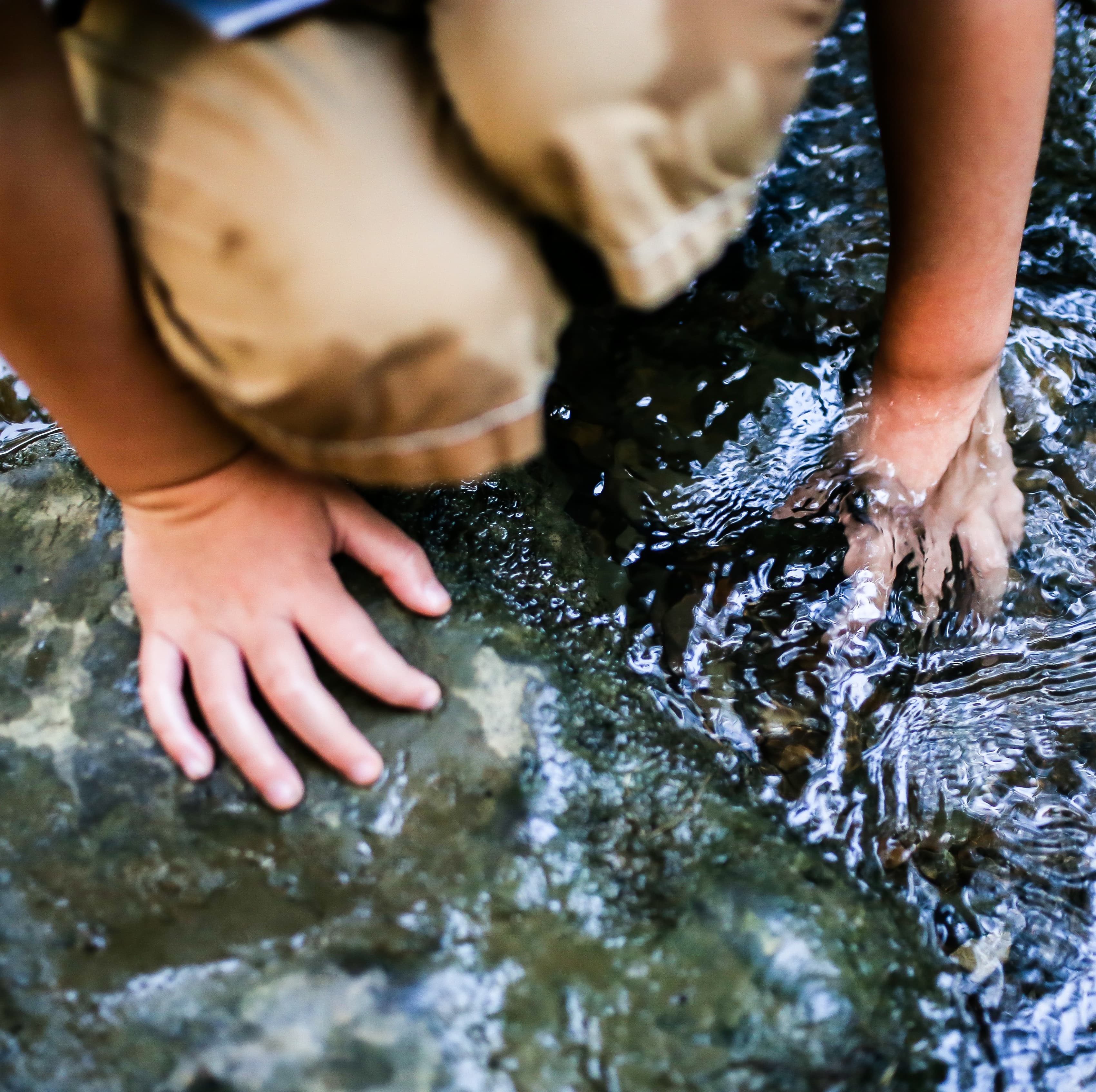 Child playing in water